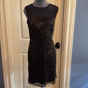 Diane Von Furstenberg Black and Gold Floral Mini Dress for women.  Size 8.